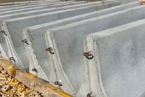 Concrete and water-filled traffic safety barriers